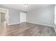Bright bedroom with grey walls and laminate wood flooring at 5791 Covington Cove Way, Orlando, FL 32829