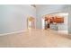 Open floor plan living room with kitchen view at 5791 Covington Cove Way, Orlando, FL 32829