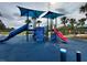 playground with slides and shade structures at 5791 Covington Cove Way, Orlando, FL 32829