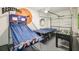 Enjoy a game room featuring a ping pong table, foosball table, and basketball arcade game at 7925 Putting Green Way, Reunion, FL 34747