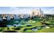 Beautiful aerial view of a golf course and luxury resort in the background at 7925 Putting Green Way, Reunion, FL 34747