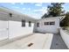 A stunning backyard with a well-kept exterior and a concrete layout, complemented by a charming brick section at 814 S Lakeshore Blvd, Lake Wales, FL 33853
