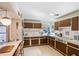 Vintage kitchen with ample cabinet space, pristine countertops, and a charming retro aesthetic at 814 S Lakeshore Blvd, Lake Wales, FL 33853