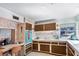 Retro kitchen with vintage-style appliances, cabinets, and countertop space, bathed in natural light at 814 S Lakeshore Blvd, Lake Wales, FL 33853