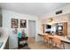 Charming kitchen featuring a breakfast bar with seating and an open view to the living area at 814 S Lakeshore Blvd, Lake Wales, FL 33853