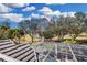 Stunning aerial view of the property, showcasing the pool and golf course views at 8148 Tibet Butler Dr, Windermere, FL 34786