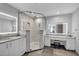 Modern bathroom with double sinks, a large shower, and a vanity at 8148 Tibet Butler Dr, Windermere, FL 34786