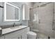 Modern bathroom with a glass enclosed shower and updated vanity at 8148 Tibet Butler Dr, Windermere, FL 34786