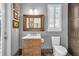 Modern bathroom with a stylish vanity and toilet at 8148 Tibet Butler Dr, Windermere, FL 34786