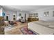 Main bedroom with hardwood floors, seating area and access to balcony at 8148 Tibet Butler Dr, Windermere, FL 34786