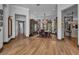 Formal dining room with hardwood floors, a large table, and a beautiful chandelier at 8148 Tibet Butler Dr, Windermere, FL 34786