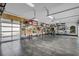 Well-organized garage with overhead storage and bike racks at 8148 Tibet Butler Dr, Windermere, FL 34786