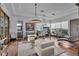 Luxurious home office with hardwood floors and large windows at 8148 Tibet Butler Dr, Windermere, FL 34786