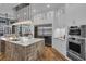 Spacious kitchen with stainless steel appliances and a large island at 8148 Tibet Butler Dr, Windermere, FL 34786