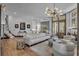 Spacious living room with hardwood floors, comfortable seating, and large windows at 8148 Tibet Butler Dr, Windermere, FL 34786