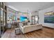 Elegant living room featuring hardwood floors and a large TV at 8148 Tibet Butler Dr, Windermere, FL 34786