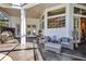 Relaxing patio with outdoor seating and built-in grill at 8148 Tibet Butler Dr, Windermere, FL 34786