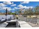 Private rooftop patio with seating, fire pit and golf course views at 8148 Tibet Butler Dr, Windermere, FL 34786