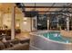Expansive pool and spa with covered patio, perfect for entertaining at 8148 Tibet Butler Dr, Windermere, FL 34786