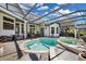 Resort-style pool and spa with ample outdoor living space at 8148 Tibet Butler Dr, Windermere, FL 34786