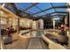 Evening view of resort-style pool and spa area at 8148 Tibet Butler Dr, Windermere, FL 34786