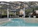 Enjoy this luxurious pool and spa with a covered patio at 8148 Tibet Butler Dr, Windermere, FL 34786