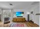 Relaxing sitting area with hardwood floors and access to balcony at 8148 Tibet Butler Dr, Windermere, FL 34786