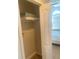 Bedroom closet with folding doors and shelving, providing ample storage space at 8189 Roseville Rd, Davenport, FL 33896
