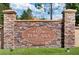 Toscana community sign featuring a stone facade with a decorative oval plaque at 8189 Roseville Rd, Davenport, FL 33896