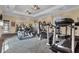 Well-equipped fitness center featuring treadmills, elliptical machines and free weights at 8189 Roseville Rd, Davenport, FL 33896