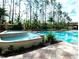 Relaxing pool area with spa and comfortable seating at 8189 Roseville Rd, Davenport, FL 33896