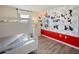 bedroom with bunk beds and a Mickey Mouse themed wall at 8896 Bengal Ct, Kissimmee, FL 34747