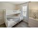 Bedroom with white bunk beds and gray blanket at 8896 Bengal Ct, Kissimmee, FL 34747