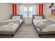 Mickey Mouse themed bedroom with two twin beds and nightstand at 8896 Bengal Ct, Kissimmee, FL 34747