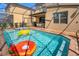 Inviting pool with inflatable rings; perfect for summer fun at 8896 Bengal Ct, Kissimmee, FL 34747