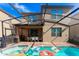 Relaxing pool and spa with patio furniture and grill at 8896 Bengal Ct, Kissimmee, FL 34747