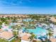Expansive community pool with surrounding homes at 9024 Shadow Mountain St, Davenport, FL 33896