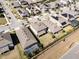 Aerial view of houses with solar panels and pools at 9459 Jaywood Rd, Winter Garden, FL 34787