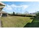 Spacious backyard with grassy lawn and privacy fence at 9459 Jaywood Rd, Winter Garden, FL 34787