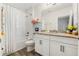 Charming bathroom with a white vanity and colorful accents at 9459 Jaywood Rd, Winter Garden, FL 34787