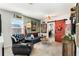 Fun game room with barn door and seating area at 9459 Jaywood Rd, Winter Garden, FL 34787