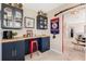 Home office with built-in cabinetry and workspace at 9459 Jaywood Rd, Winter Garden, FL 34787