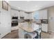 Modern kitchen with stainless steel appliances and granite countertops at 9459 Jaywood Rd, Winter Garden, FL 34787