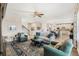 Open living space with comfortable seating and view into the kitchen at 9459 Jaywood Rd, Winter Garden, FL 34787