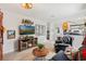 Cozy living room featuring a fireplace and comfy seating at 9459 Jaywood Rd, Winter Garden, FL 34787