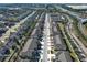 A lovely aerial view of the neighborhood showcasing the neatly aligned homes and green landscape at 1044 Pavia Dr, Apopka, FL 32703