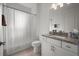 Bathroom with shower/tub combo and granite vanity at 1069 Avery Meadows Way, Deland, FL 32724
