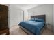 Guest bedroom with a queen-size bed and ample closet space at 1069 Avery Meadows Way, Deland, FL 32724