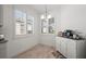 Kitchen breakfast nook with white cabinets and wood flooring at 1069 Avery Meadows Way, Deland, FL 32724