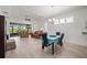 Dining room with hardwood floors and view of living room and kitchen at 1069 Avery Meadows Way, Deland, FL 32724